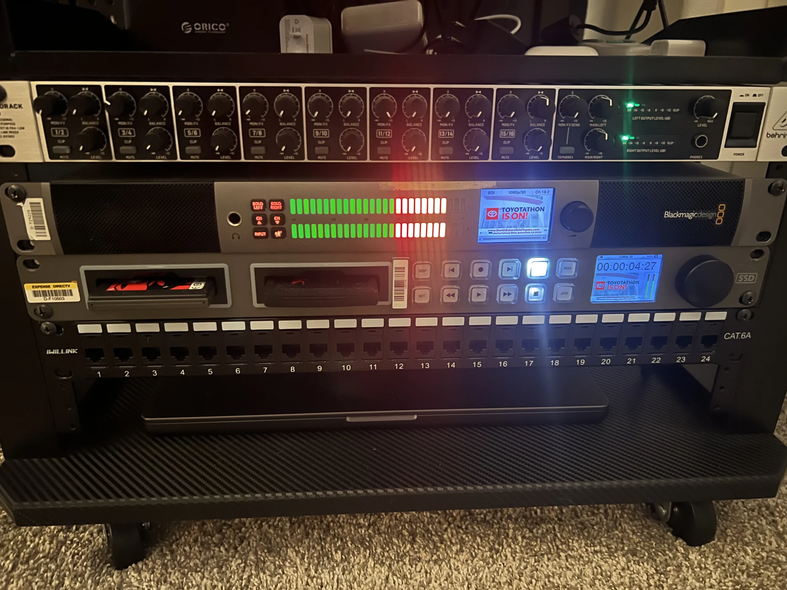 Post Production Studio Irvine A rack of post production gear. Audio meters are seen.